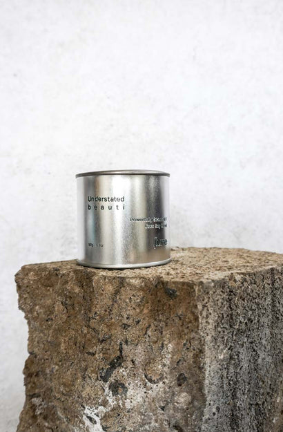 Tin Candle - Understated Beauti - Ylang Ylang, Lotus Blossoms, Patchouli, Camellias, Caramel, Sandalwood